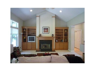 Great Room. Custom cabinetry in maple, floor to ce
