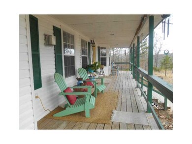 Patio/Deck. The covered front porch is an  inviting place to relax with family and friends.