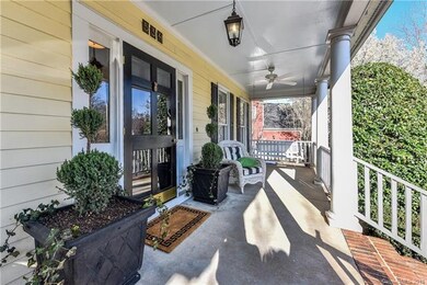 Rocking chair front porch with two ceiling fans an