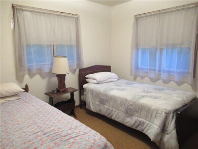 Bedroom with built in dresser in closet