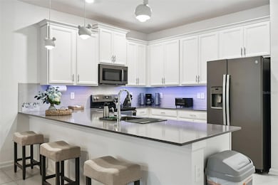 8879 Cabot Cliffs Dr unit 103, Four Corners, FL 34747 - photo 5