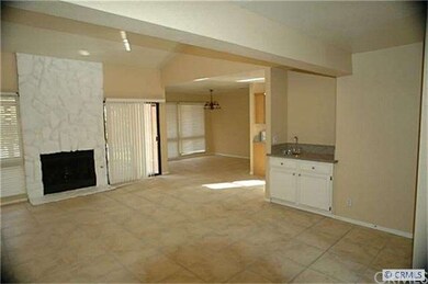 Light, bright interior features a living room with