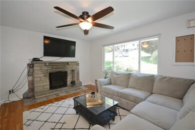 The focal point of the living room is the fireplac