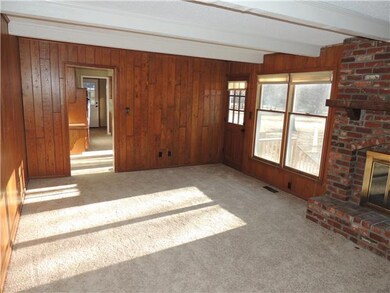 Family Room adjacent to Kitchen with access to Pat