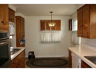Kitchen looking eat in area from pocket door