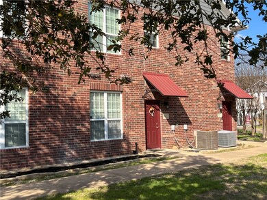 View of front of house featuring central air condi