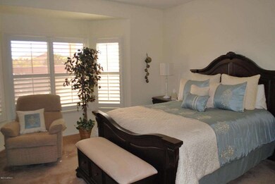 Master bedroom w/ bay window