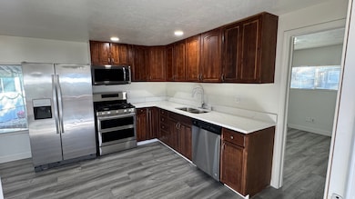 4634 Mount Baldy Dr unit 243, Taylorsville, UT 84123 - photo 3