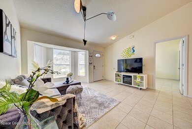 living room with tile floor