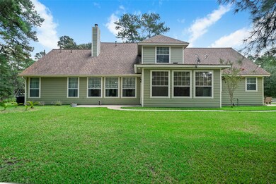 This is an AMAZING backyard! Family barbeques and gatherings will be a must! Your kids and critters will love it! Look at all those windows!