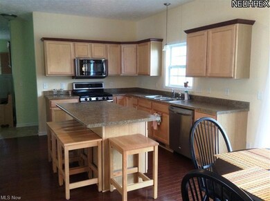 Kitchen has wonderful maple cabinets and high end 