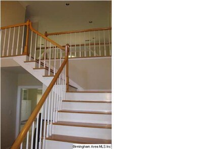 Pretty hard wood stairs to 2nd level