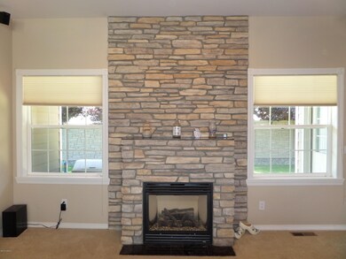 Ceiling to Floor Rock Fireplace