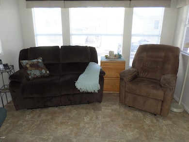 LIVING AREA RECLINER AND SOFA