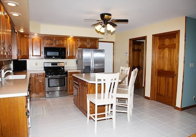 Access to the laundry room, full bath, pantry, gar