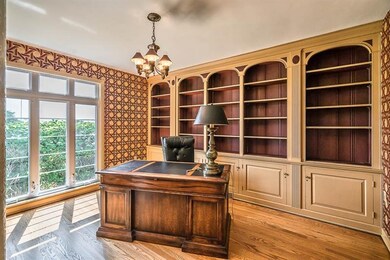 BEAUTIFUL MAIN LEVEL DEN WITH BUILT INS.....OVERLO
