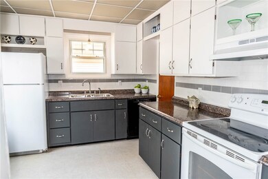 First floor kitchen looking in from entry. Showing
