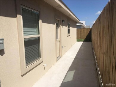 View of property exterior featuring a patio area