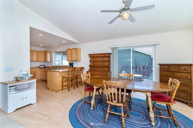 Dining area off the kitchen with sliders to the patio.