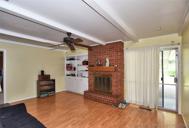View of Den.  Wood Burning Fireplace