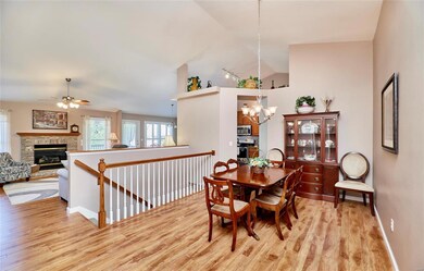 Separate dining room, laminate flooring, vaulted c