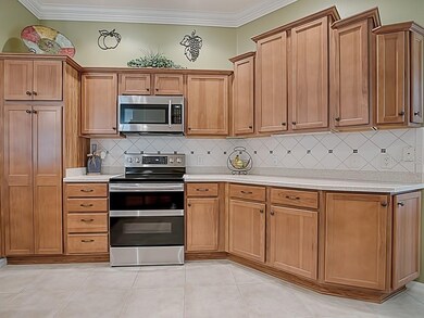 NEW STAINLESS SMOOTH-TOP ELECTRIC RANGE WITH DOUBL