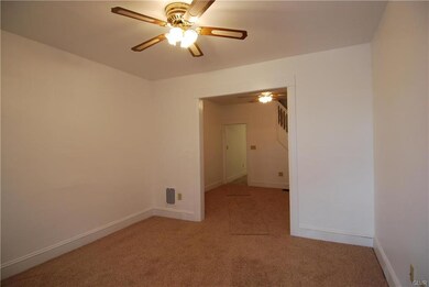 Entering through front door into living room which