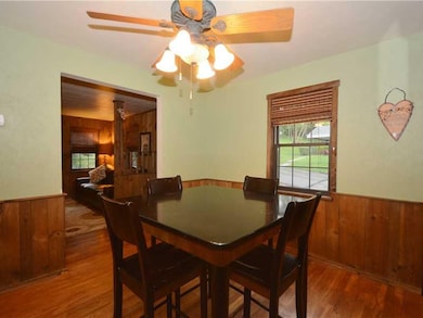 Dining Room. The dining room has exposed hardwood 