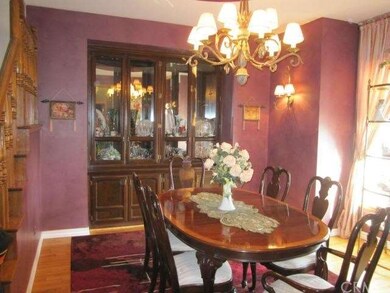 Formal dining room with built-in china cabinet.