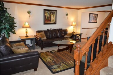 Living room opens to formal dining room