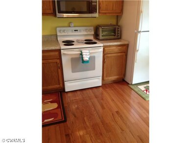 Kitchen - New hardwood floors in kitchen and foyer