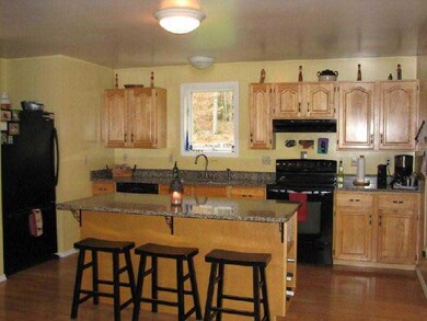 Kitchen. Open to dining area.