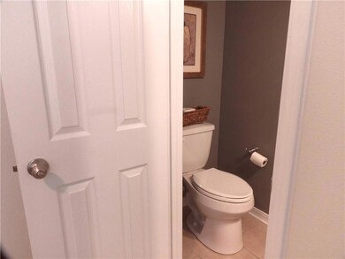 Half Bath Off of Kitchen.