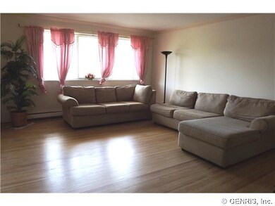 Living Room. Spacious living room with gleaming ha