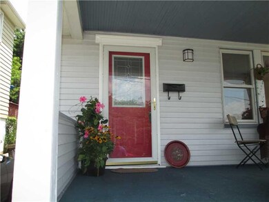 Exterior Front. INVITING FRONT PORCH WITH A LEADED