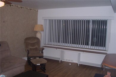 Living room with window view.