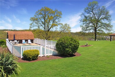 In ground pool overlooking beautiful 1.3 acres