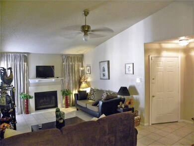 Spacious living room. Completely tiled.