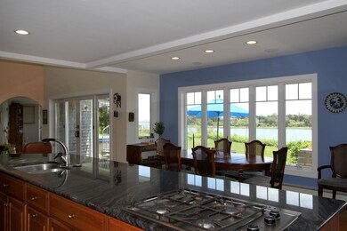Kitchen & dining out to the Cove