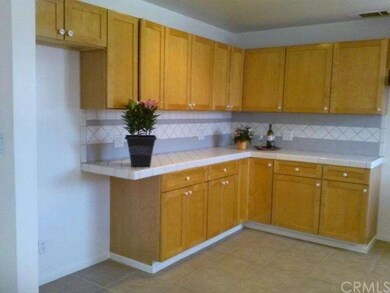 1237- Custom Built Maple Cabinets
