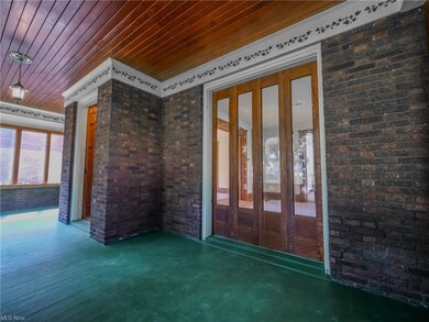 Front Porch with entryway and doors to the dining 