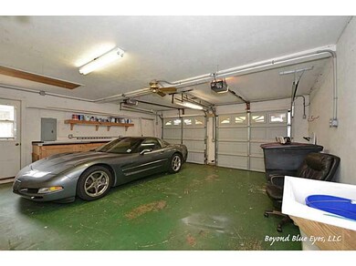 Photo. Awesome two car garage with utility sink an