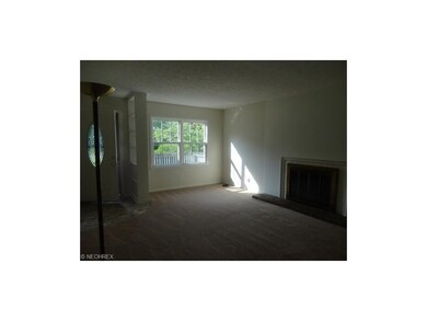 Living room with lots of window light and front do