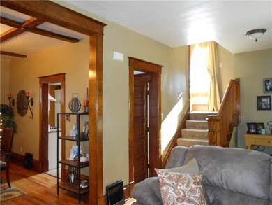 Front Living Room opens to dining and staircase to