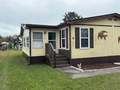 View of front of property featuring a front yard