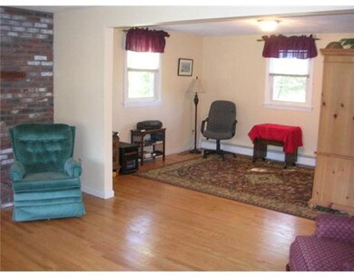 Den/Family/Great Room. Living room opens to back d
