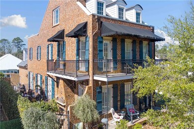 View of side of property featuring brick siding