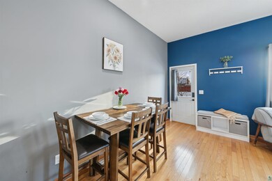 Dining room with light hardwood / wood-style floor