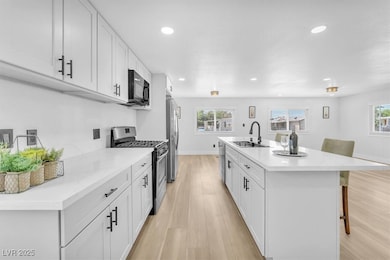 Kitchen featuring appliances with stainless steel