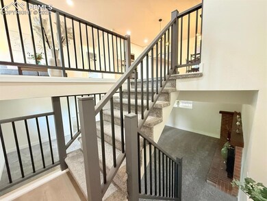 Stairs featuring recessed lighting and carpet floors